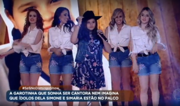 Clara, aluna da Amare, realiza sonho e canta com Simone e Simaria no palco do Domingo Show da Rede Record.